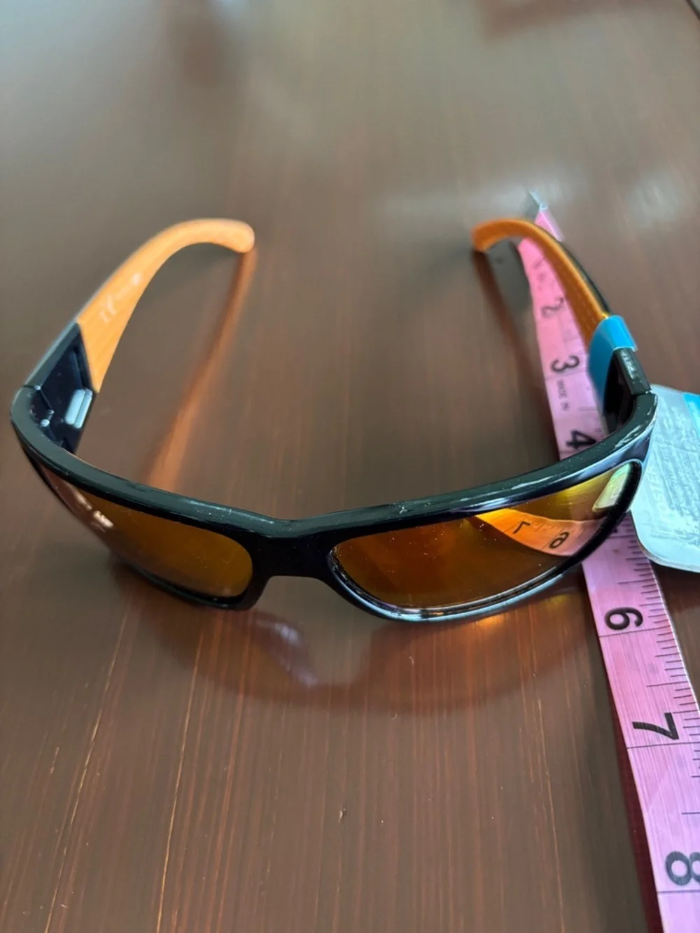 Foster Grant 100% UVA-UVB protect,black frame,rainbow mirror lens, rubber temple